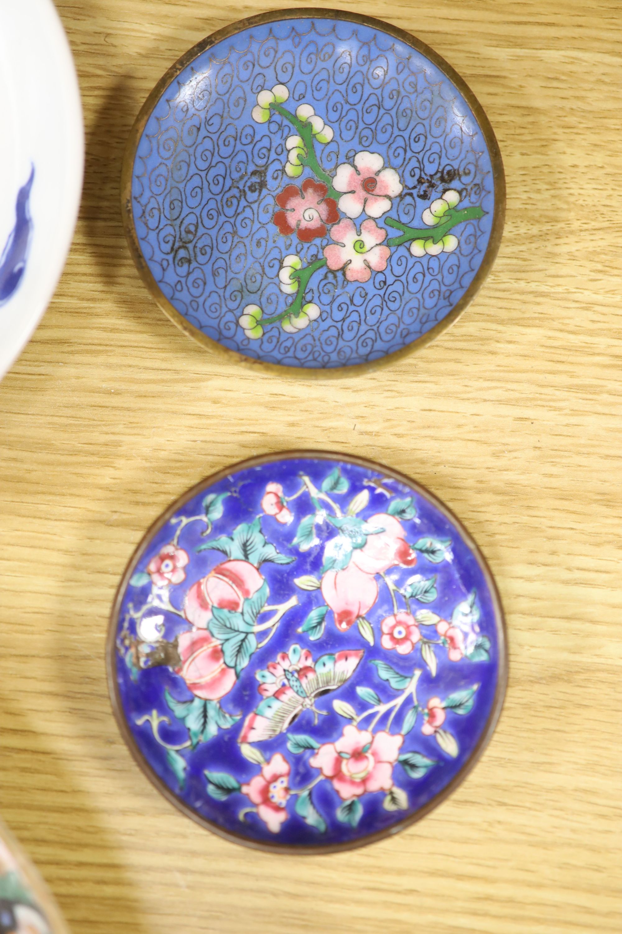 A quantity of Chinese and Japanese ceramics, including a blue and white dragon dish, a Cantonese famille rose dish, four cloisonne pi